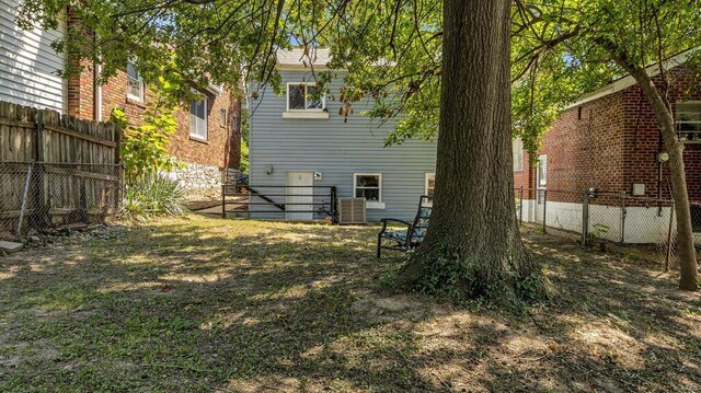 view of yard with a fenced backyard