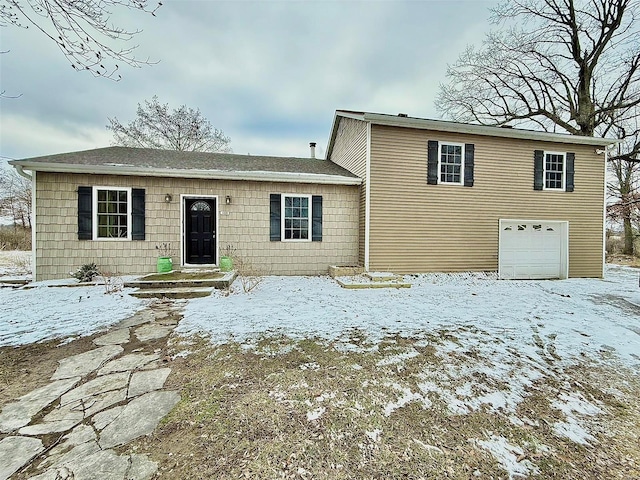 view of front of property featuring an attached garage