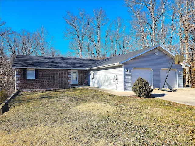 ranch-style house featuring a front lawn, concrete driveway, brick siding, and an attached garage