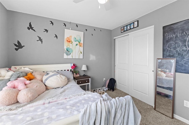 bedroom featuring carpet, ceiling fan, and a closet