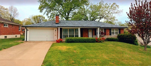 ranch-style home with an attached garage, driveway, a chimney, and a front yard