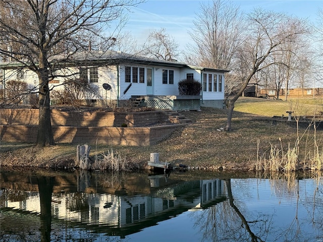 exterior space with a water view