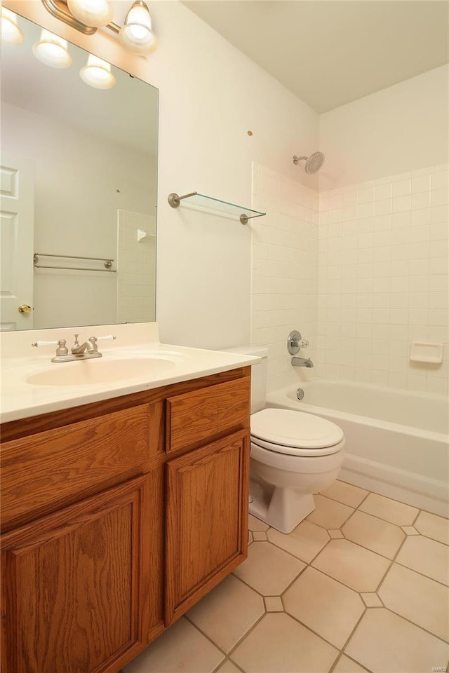 full bathroom with shower / washtub combination, tile patterned flooring, vanity, and toilet