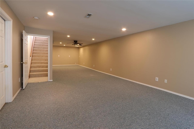 unfurnished room featuring recessed lighting, visible vents, carpet flooring, baseboards, and stairs