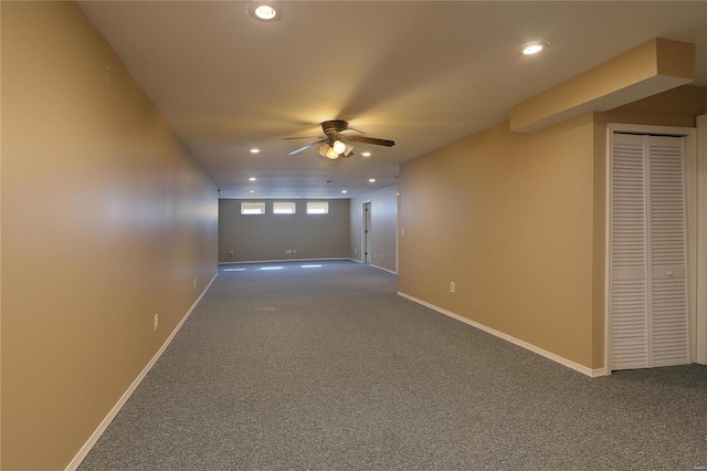 carpeted empty room featuring recessed lighting, ceiling fan, and baseboards