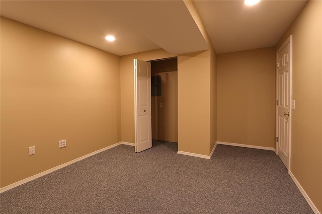 interior space with carpet, baseboards, and recessed lighting