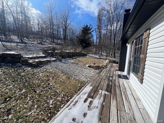 view of snow covered deck