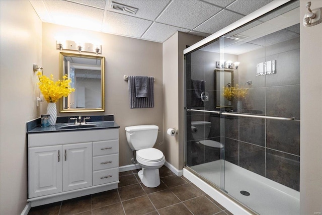 full bath featuring visible vents, toilet, a stall shower, vanity, and tile patterned flooring