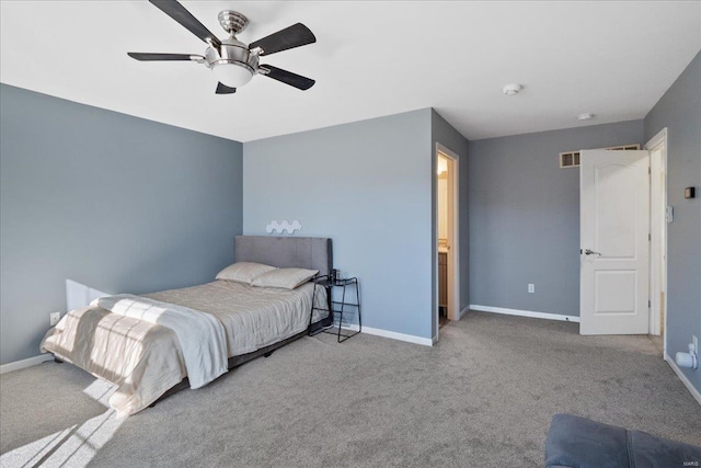 carpeted bedroom featuring ceiling fan and baseboards