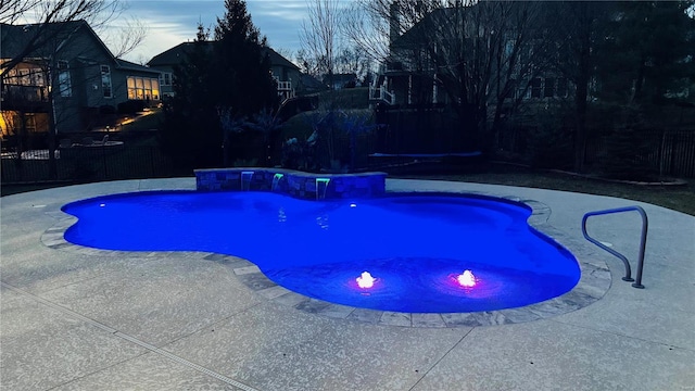 view of pool with a patio area, fence, and a fenced in pool