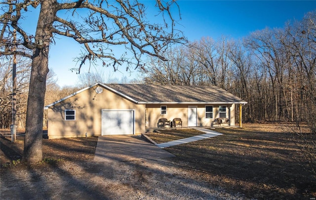 exterior space featuring aphalt driveway