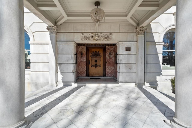 doorway to property with stone siding