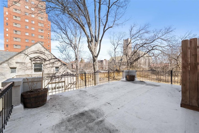 view of patio / terrace featuring fence