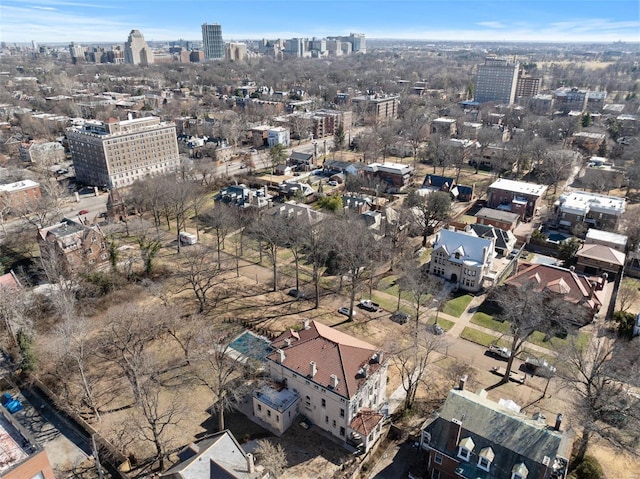 birds eye view of property with a city view