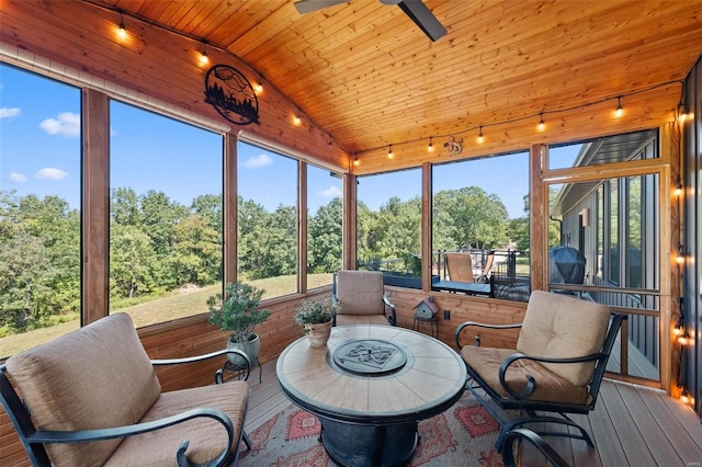 sunroom / solarium with wooden ceiling and vaulted ceiling