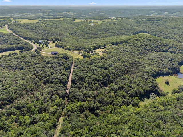 aerial view featuring a forest view