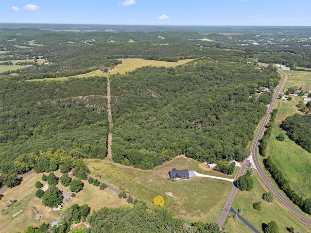 drone / aerial view with a forest view