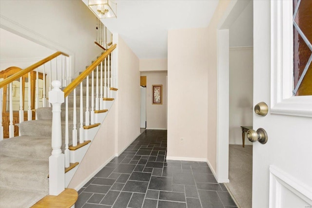 interior space featuring baseboards