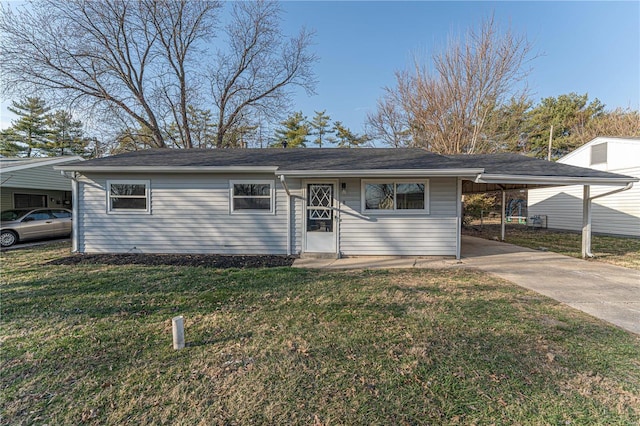 ranch-style house featuring a carport, concrete driveway, and a front yard