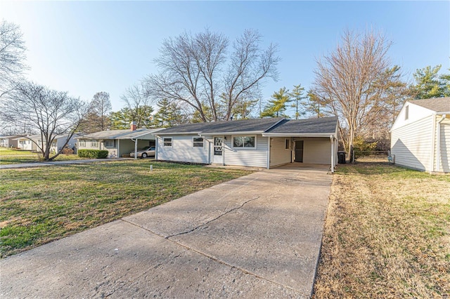 ranch-style house featuring a carport, concrete driveway, a front lawn, and fence