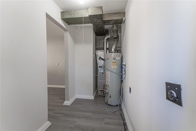 utility room featuring water heater