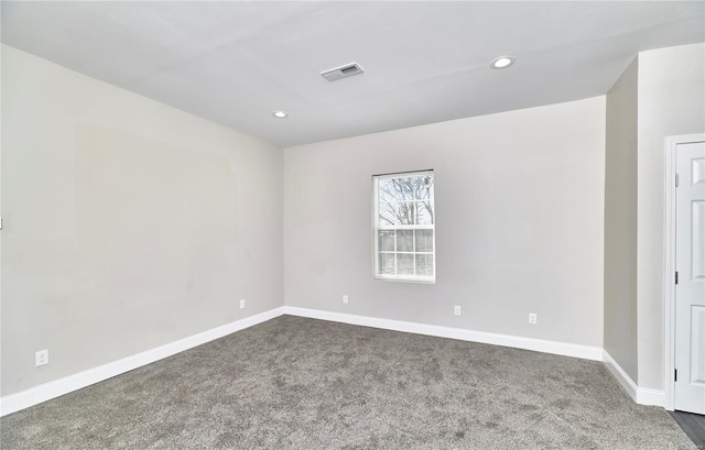 empty room with recessed lighting, baseboards, visible vents, and dark colored carpet