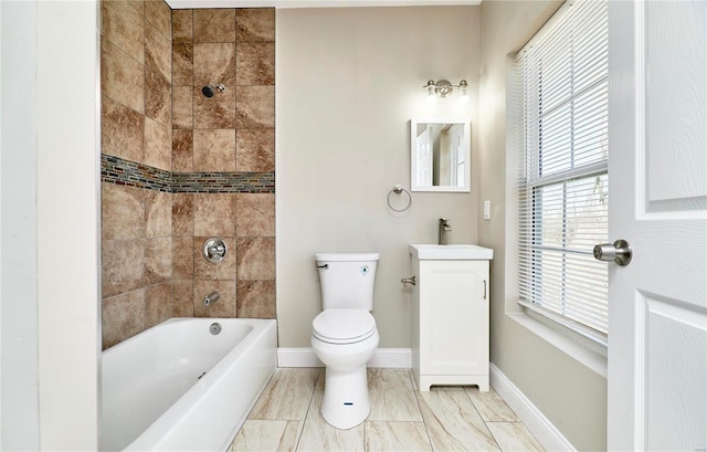 full bathroom with vanity, toilet, washtub / shower combination, and baseboards