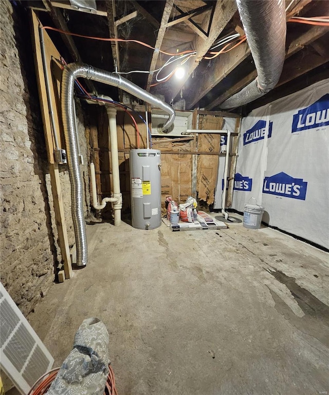 unfinished basement featuring water heater