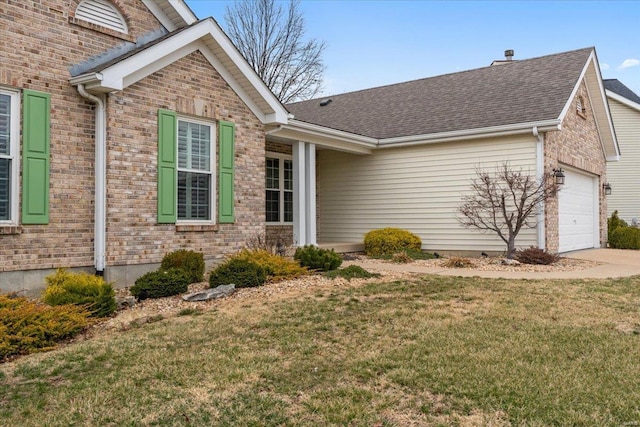 view of property exterior featuring a garage, driveway, a shingled roof, and a lawn