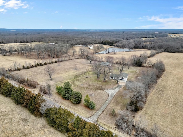 drone / aerial view with a rural view and a water view