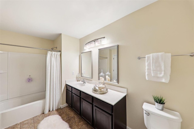 full bath with toilet, tile patterned floors, shower / bath combination with curtain, and vanity