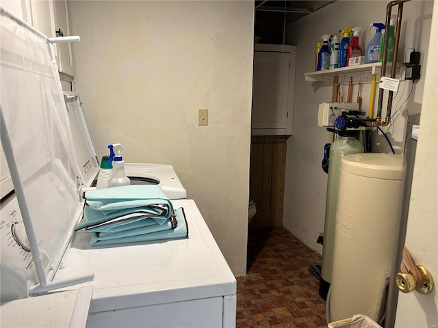 laundry room featuring laundry area and washer / clothes dryer