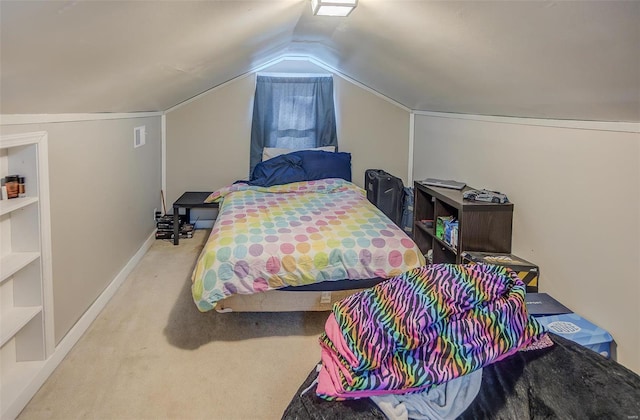 bedroom with lofted ceiling, visible vents, baseboards, and light colored carpet