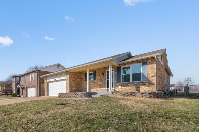 ranch-style house with brick siding, fence, concrete driveway, a front yard, and a garage