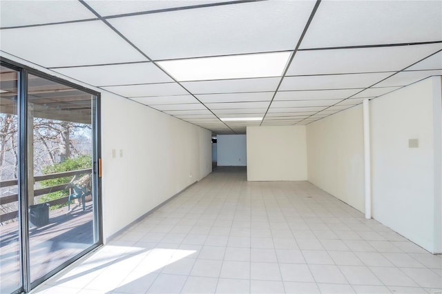 empty room with a paneled ceiling