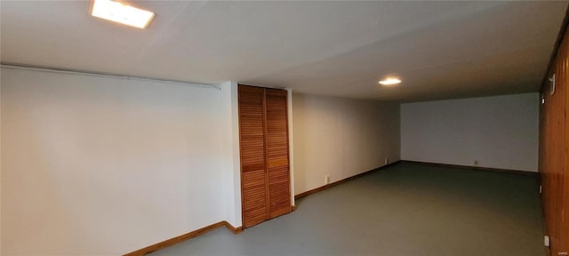 finished basement featuring baseboards