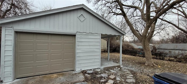 detached garage with fence