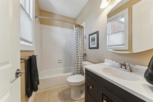 bathroom with tile patterned flooring, toilet, vanity, and shower / tub combo