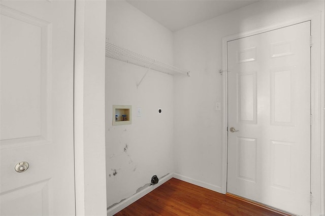 washroom featuring washer hookup, dark wood-style flooring, electric dryer hookup, laundry area, and baseboards