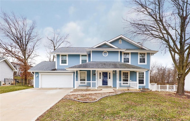 view of front of property featuring driveway, a front lawn, fence, and a porch