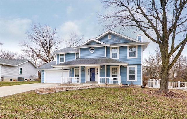 view of front of property featuring a porch, fence, driveway, a front lawn, and a chimney