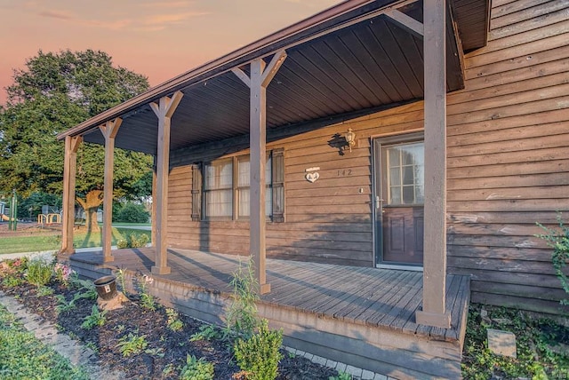 entrance to property with covered porch