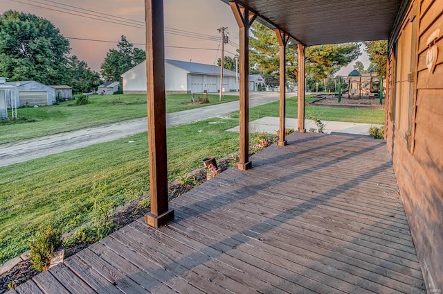 view of patio / terrace with a porch and a playground