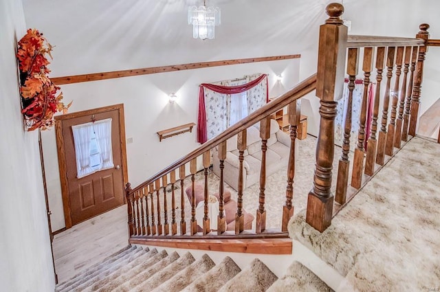 stairs with wood finished floors