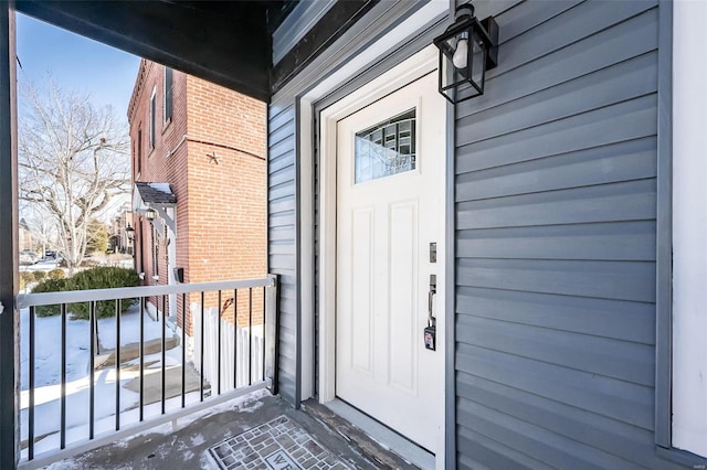 property entrance with a balcony