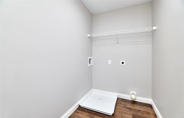 laundry room with hookup for a washing machine, hookup for an electric dryer, laundry area, dark wood-style flooring, and baseboards