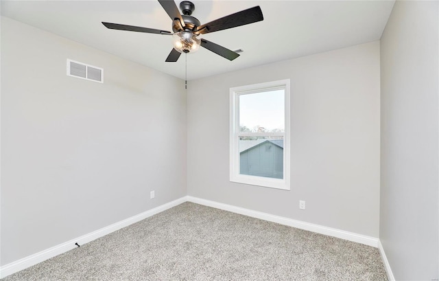 unfurnished room featuring a ceiling fan, baseboards, visible vents, and carpet flooring