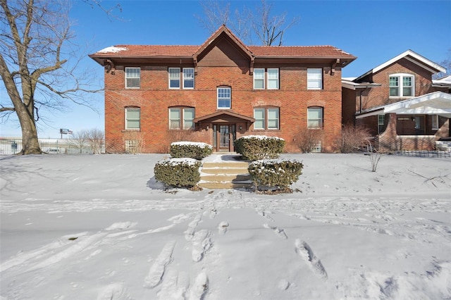 view of front of home with brick siding