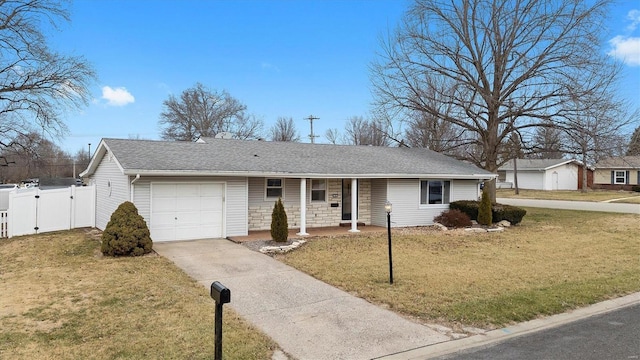 single story home featuring covered porch, a gate, a garage, stone siding, and a front lawn