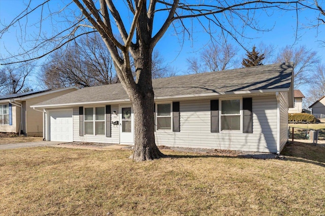 single story home featuring a garage, a front lawn, concrete driveway, and roof with shingles